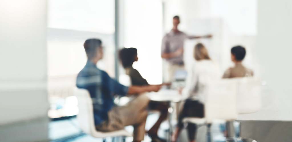 Team of people in a conference room