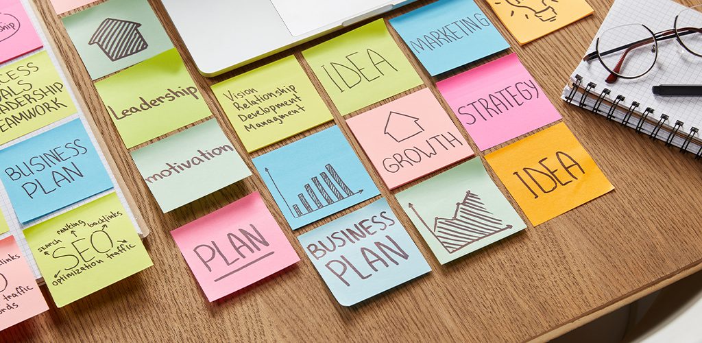 Sticky notes with ideas for a business plan