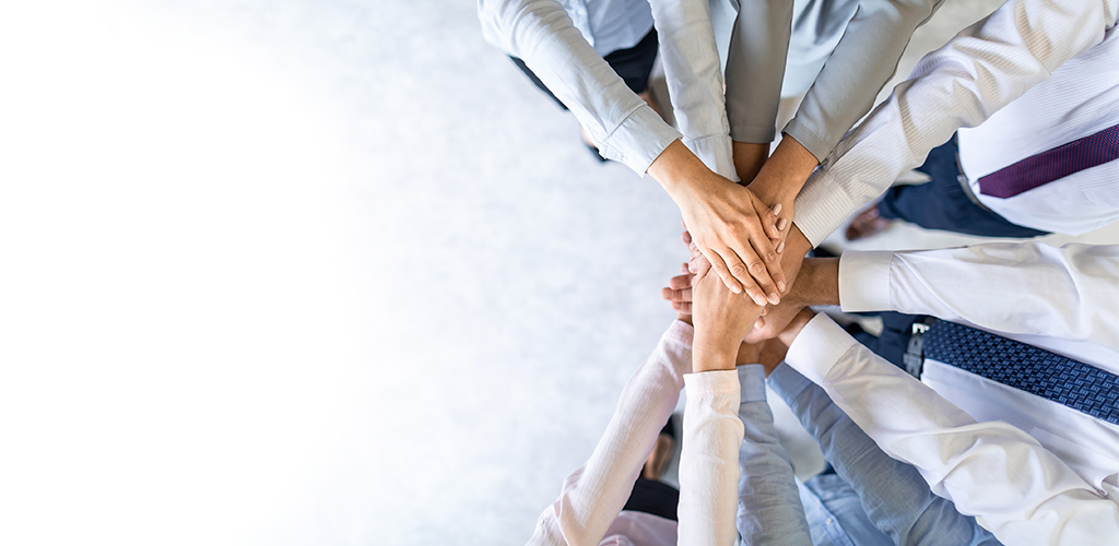 Staff team with stacked hands