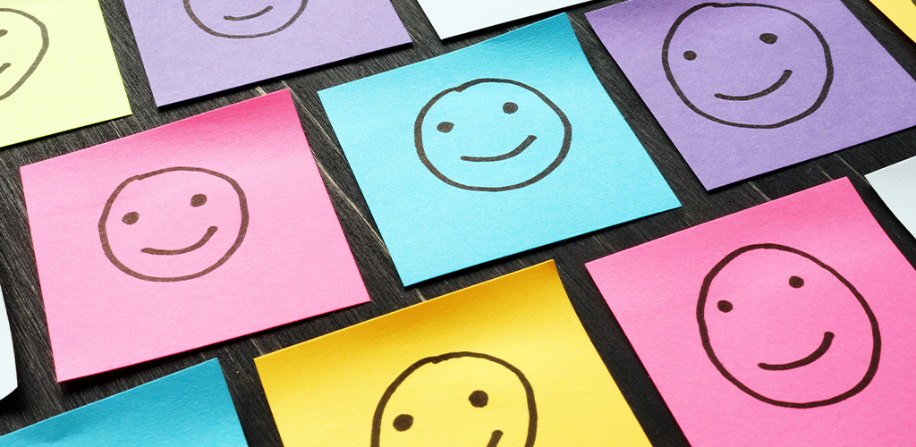 Smiley faces on sticky notes for happy customers