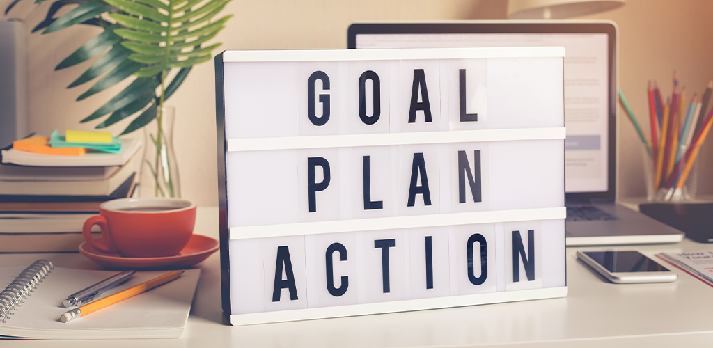 Motivational sign with the phrase "goal, plan, action"